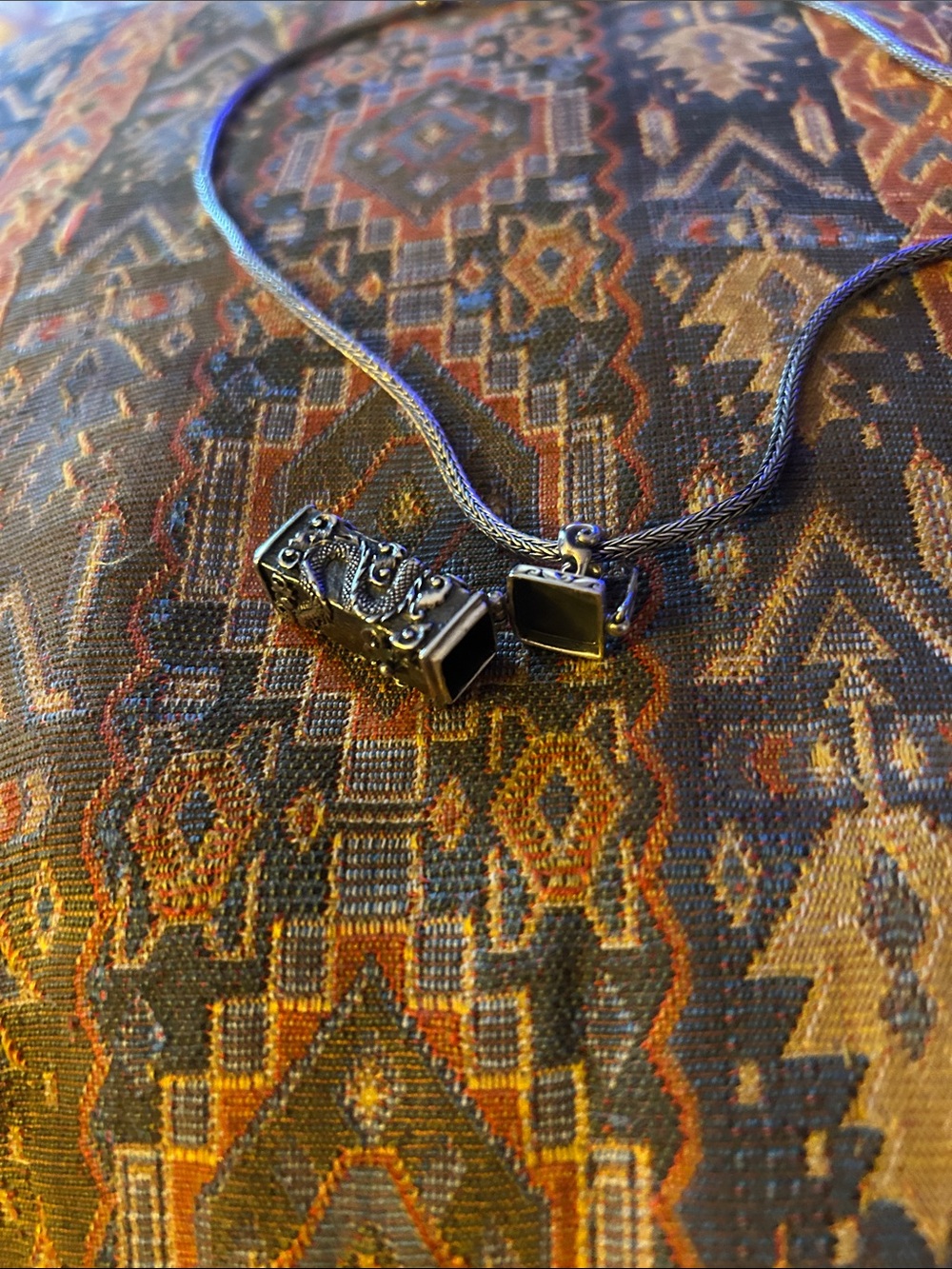 Beautiful dragon box necklace with heavy snake chain.